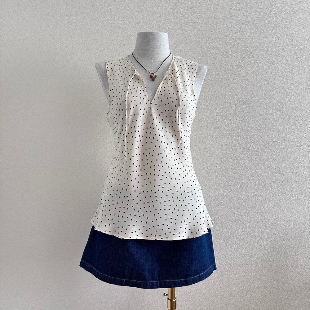 cream and black polka dot sleeveless top